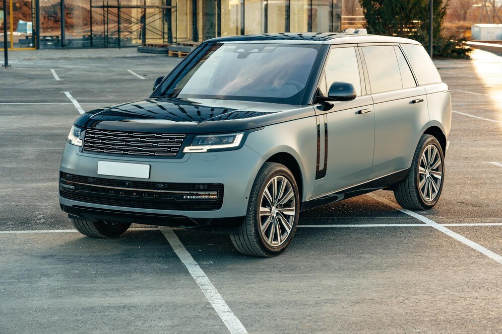 luxury-suv-car-parked-against-background-glass-building_
