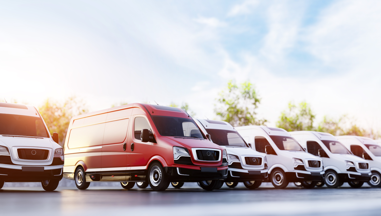 Red cargo van leading a fleet of white delivery vans.