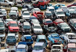 Junkyard filled with damaged cars