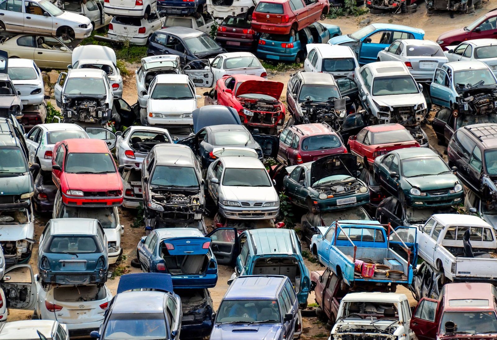 Junkyard filled with damaged cars