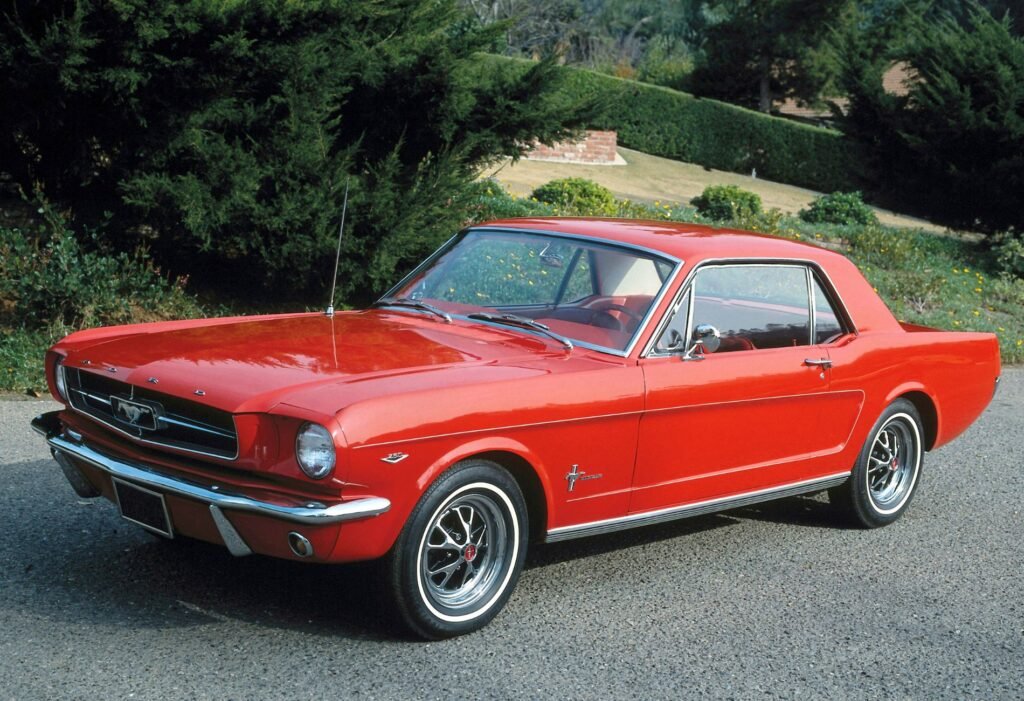 Red classic Mustang parked outdoors