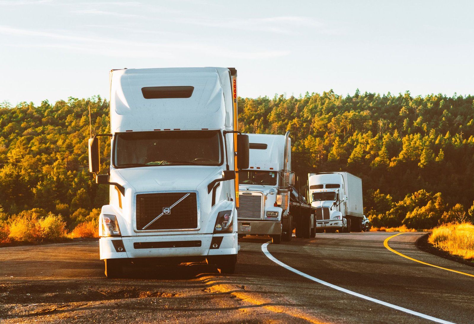 Semi trucks driving on highway