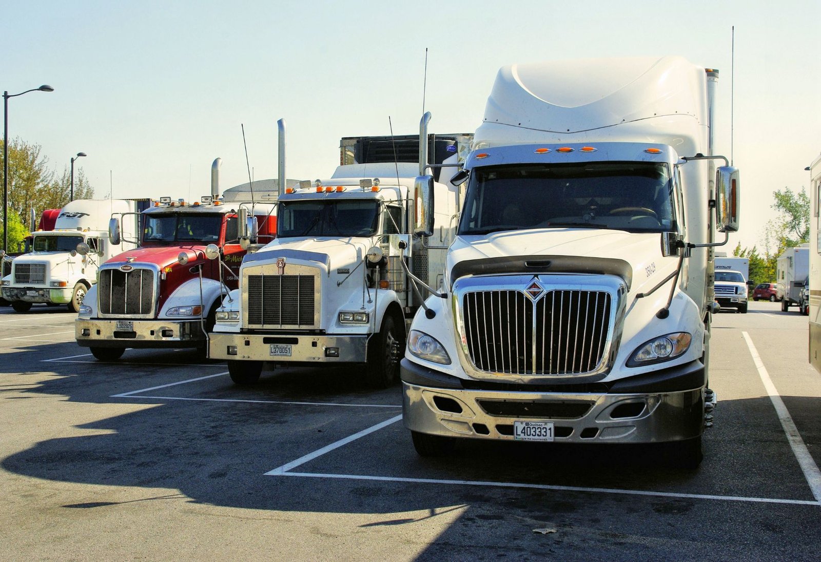Semi trucks parked in a truck lot